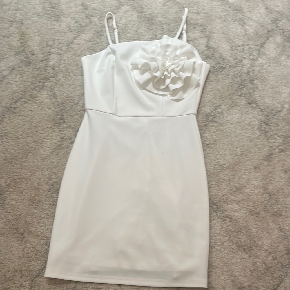 Elegant White Dress with Floral Detail